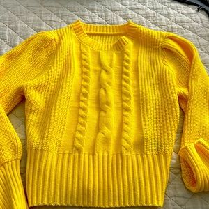 Beautiful, bright, yellow spring sweater